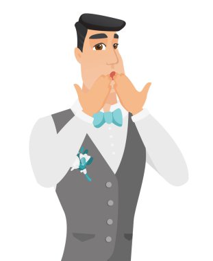 Genç shoked beyaz damat ağzını kapsayan.