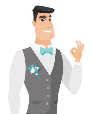 Ok işaret gösteren genç beyaz damat.