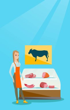 Taze et kasap dükkanında sunan kasap.