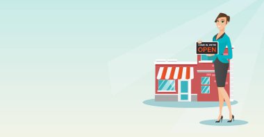 Açık tabela holding beyaz dükkan sahibi.