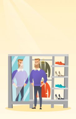 Kazak bir soyunma odasında üzerinde çalışan beyaz adam