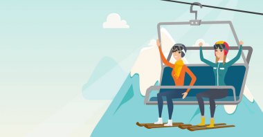 İki beyaz kayakçı Kayak Merkezi teleferik kullanarak.