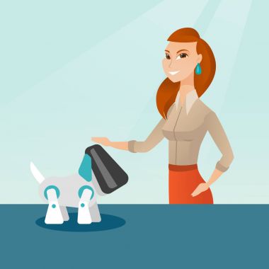 Robot köpek ile oynayan genç Kafkas kadın.