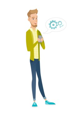 Bir cep telefonu tutan beyaz iş adamı.