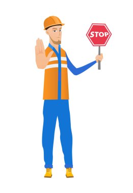 Kırmızı yol tutan genç beyaz Oluşturucu.