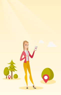 Kafkas kadın Smartphone'da aksiyon oyunu oynarken.