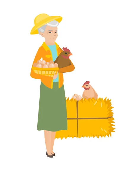 Senior farmer holding chicken and basket of eggs. — Stock Vector