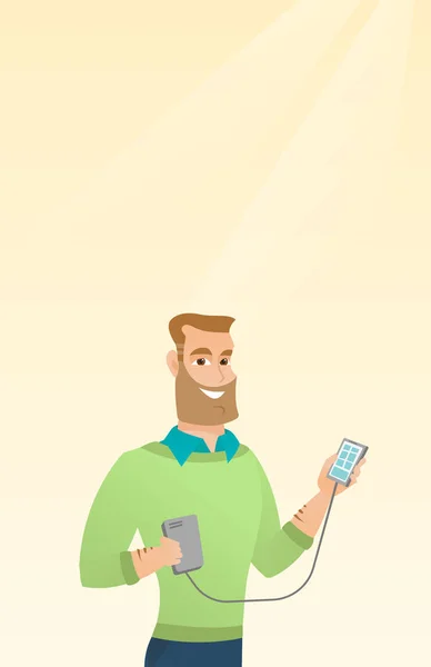 Hombre reharging smartphone de la batería portátil . — Vector de stock