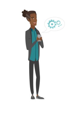 Bir cep telefonu tutan genç Afro-Amerikan adam.