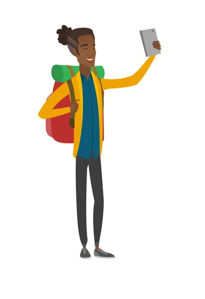 Mladý africký cestovatel s batohem, takže selfie — Stockový vektor