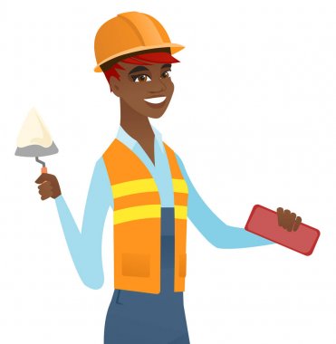 Afrika Duvarcı ustası spatula ve tuğla ile çalışma.