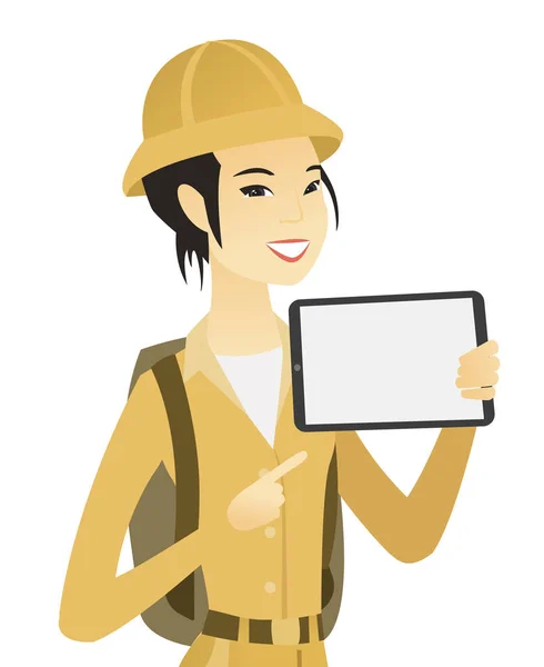 Young asian traveler holding tablet computer. — Stock Vector