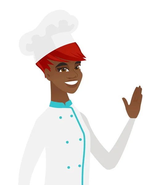 Jovem chef afro-americano acenando a mão . —  Vetores de Stock