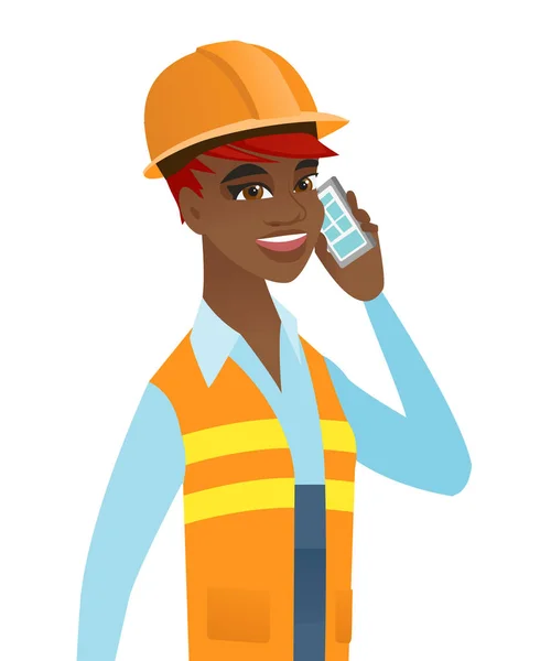 Joven constructor africano hablando por teléfono móvil . — Vector de stock