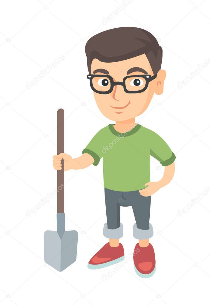 Caucasian smiling boy in glasses holding a shovel.