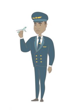 Genç Afrikalı pilot uçak modeli ile.