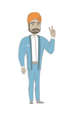 Hindu işadamı gösteren zafer jest.