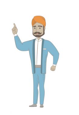 Onun işaret parmağı yukarıyı Hindu işadamı.