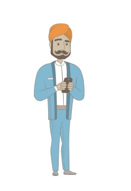 Hindu işadamı bir cep telefonu tutan.