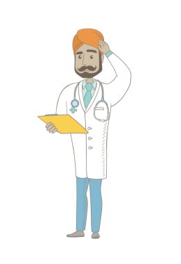 Genç Hintli doktor başını tırmalamak.