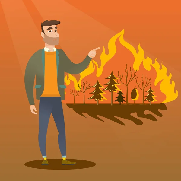 Hombre de pie en el fondo de un incendio forestal . — Vector de stock