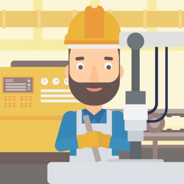 Endüstri/sanayii donatımı ile çalışan adam.