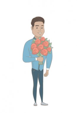 Buket çiçek tutan Latin asıllı işadamı.