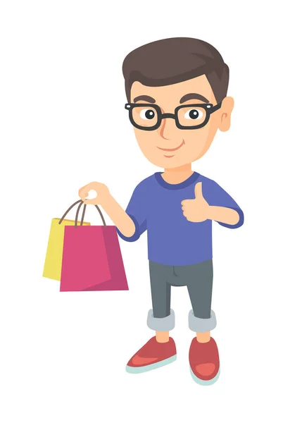 Ευτυχισμένος Καυκάσιος αγόρι, κρατώντας τσάντες για ψώνια. — Διανυσματικό Αρχείο