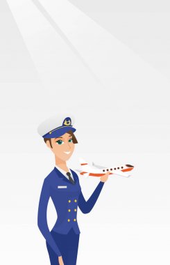 Neşeli havayolu pilot uçak modeli ile.