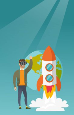 Beyaz adam açık alanda uçan vr kulaklık.