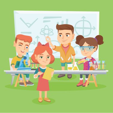 Beyaz çocuklar kimya dersinde çalışma.