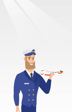 Neşeli havayolu pilot uçak modeli ile.