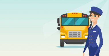 Genç beyaz kadın okul otobüsü sürücüsü.