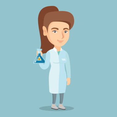 Bilim adamı holding şişesi biyolojik tehlike işareti ile.