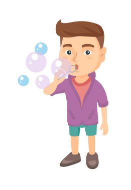 Küçük beyaz çocuk sabun köpüğü üfleme.