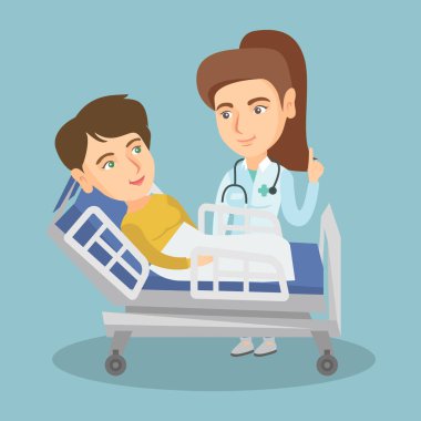 Doktor hasta bir hastane odasında ziyaret etti.