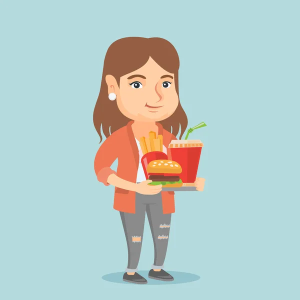Mujer caucásica sosteniendo bandeja llena de comida rápida . — Vector de stock