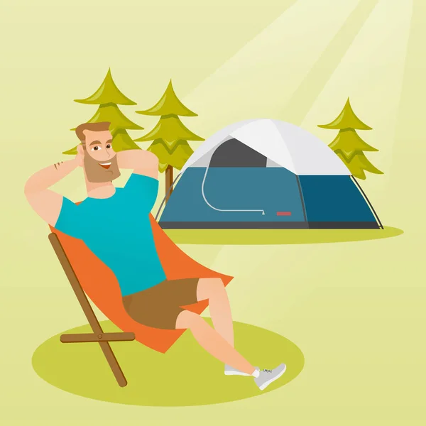 Man zit in een opvouwbare stoel op de camping. — Stockvector