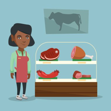 Taze et kasap dükkanında sunan kasap.