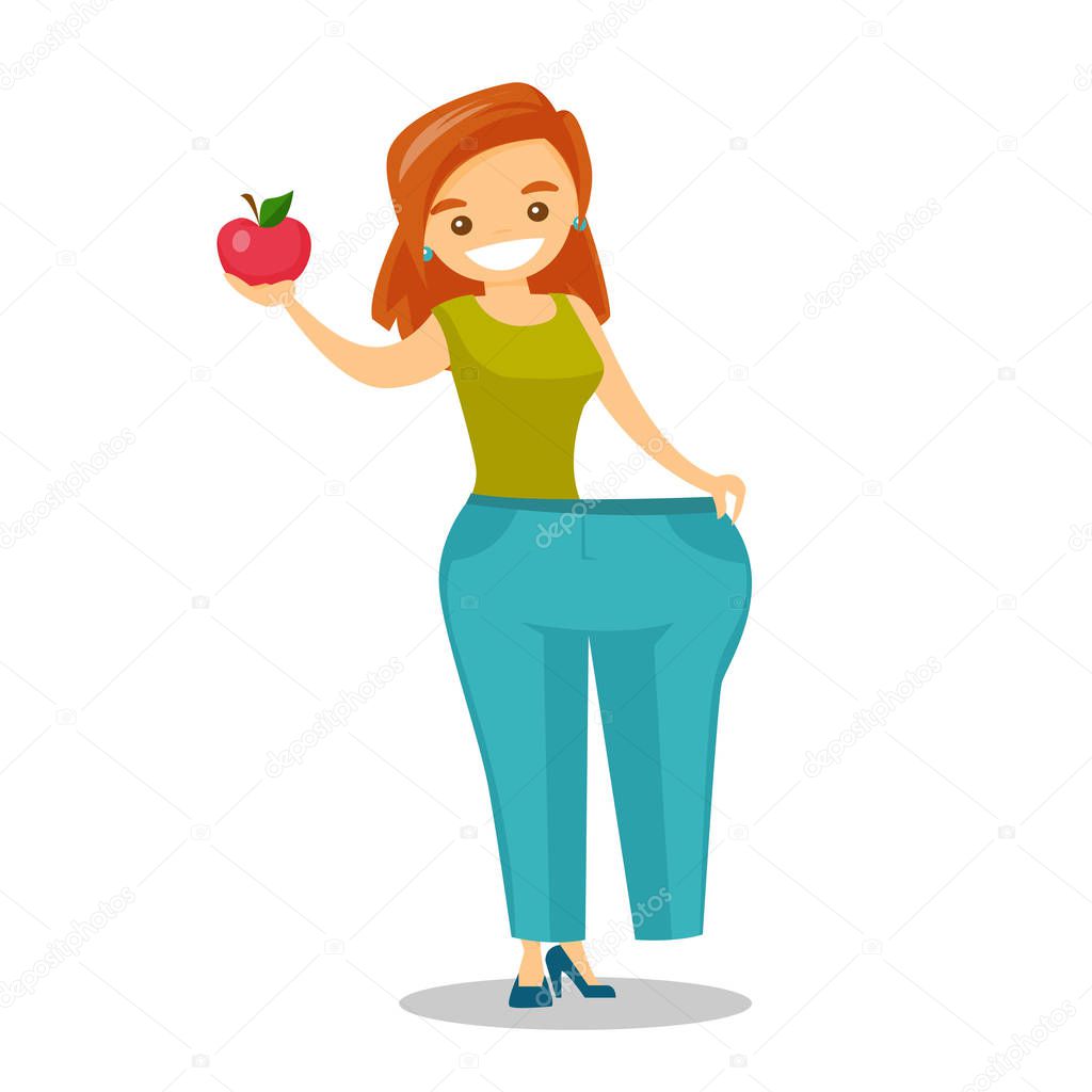 Slim woman in pants showing the results of diet.