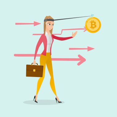 Olta üzerinde bitcoin yakalamaya çalışan bir kadına.