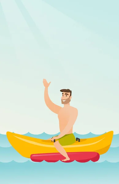 Jovem homem caucasiano feliz montando um barco de banana . —  Vetores de Stock