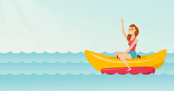 Junge glückliche kaukasische Frau auf einem Bananenboot. — Stockvektor