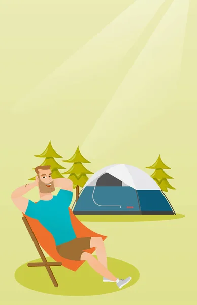 Man zit in een opvouwbare stoel op de camping. — Stockvector