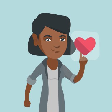 Genç Afrikalı kadın kalp tuşuna basarak düğme şeklinde.