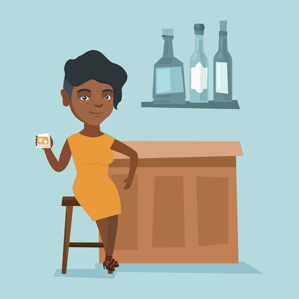 Mujer africana joven sentada en el mostrador del bar . — Vector de stock