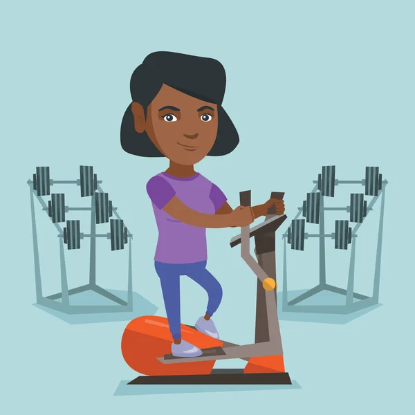 African woman exercising on elliptical trainer. — Stock Vector