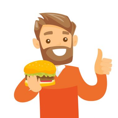 Genç beyaz beyaz adam yeme hamburger.