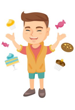 Mutlu beyaz çocuk tatlılar sürü arasında ayakta.