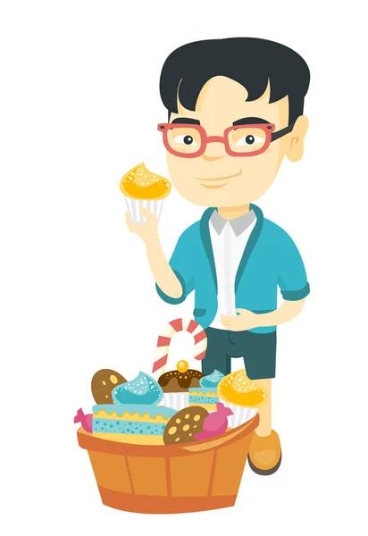 Ragazzo in possesso di un cupcake e accarezzando la pancia . — Vettoriale Stock